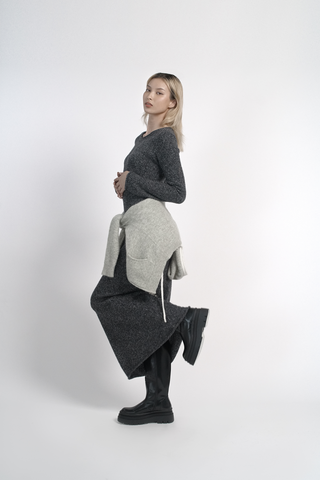 Girl in a black maxi dress. Made of headstock. 