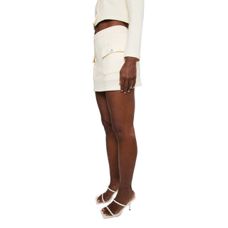 mini skirt with front pockets and shell buttons details